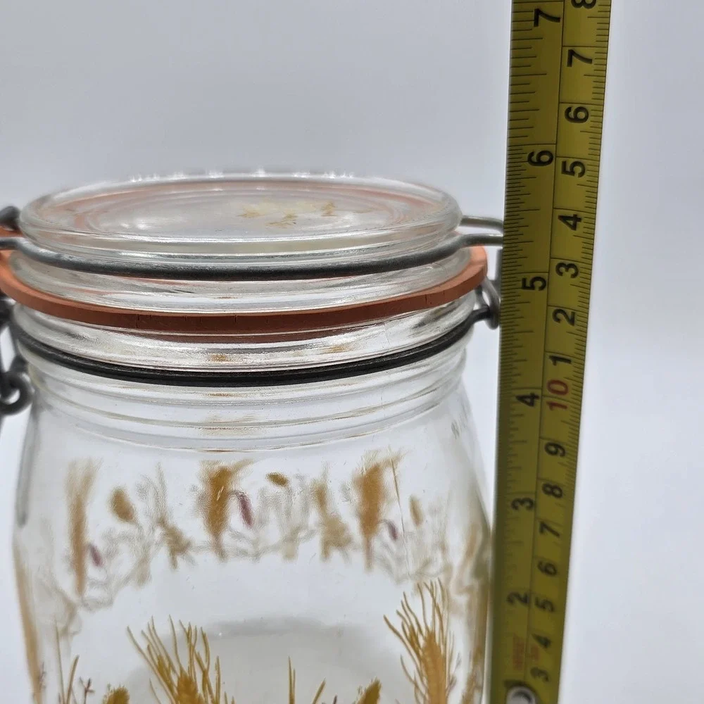 Vintage glass canister with wheat design Lid is stamped arc France